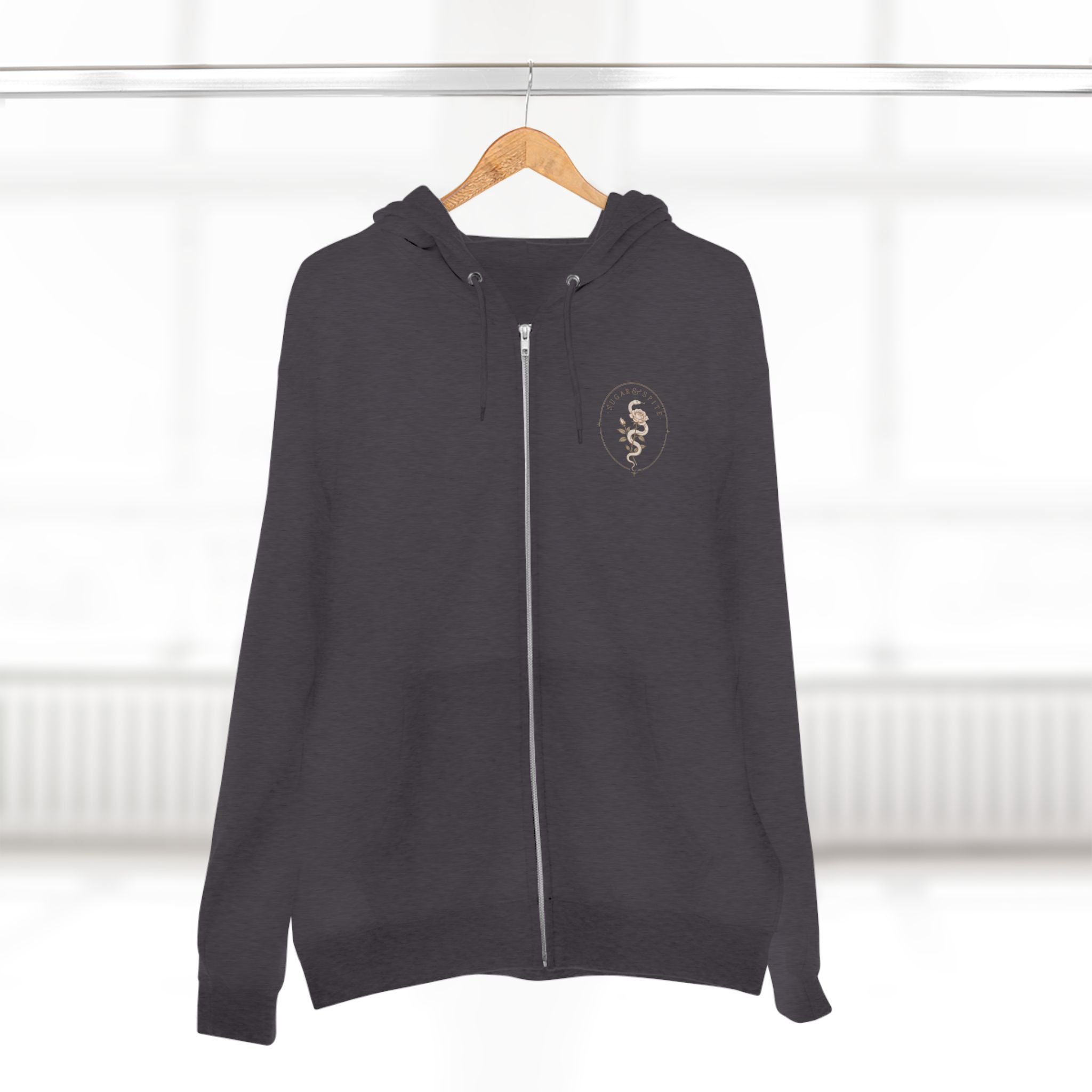 Minimal Floral Crest Zip Hoodie — Small Rose Emblem Chest Design