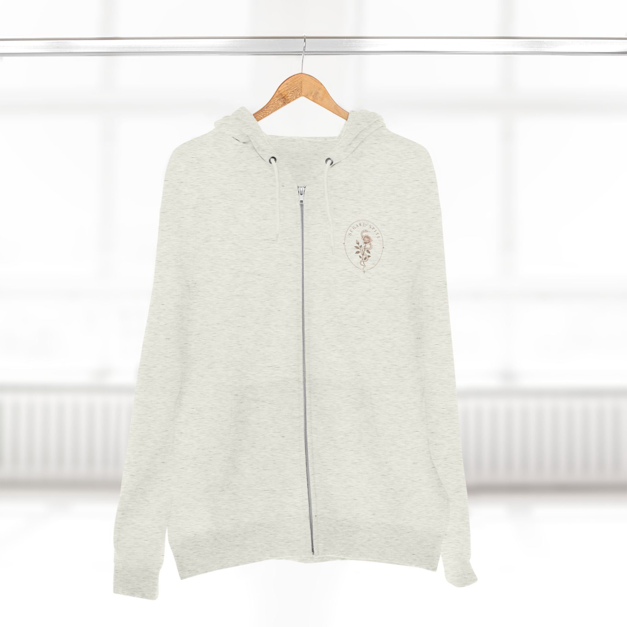 Minimal Floral Crest Zip Hoodie — Small Rose Emblem Chest Design