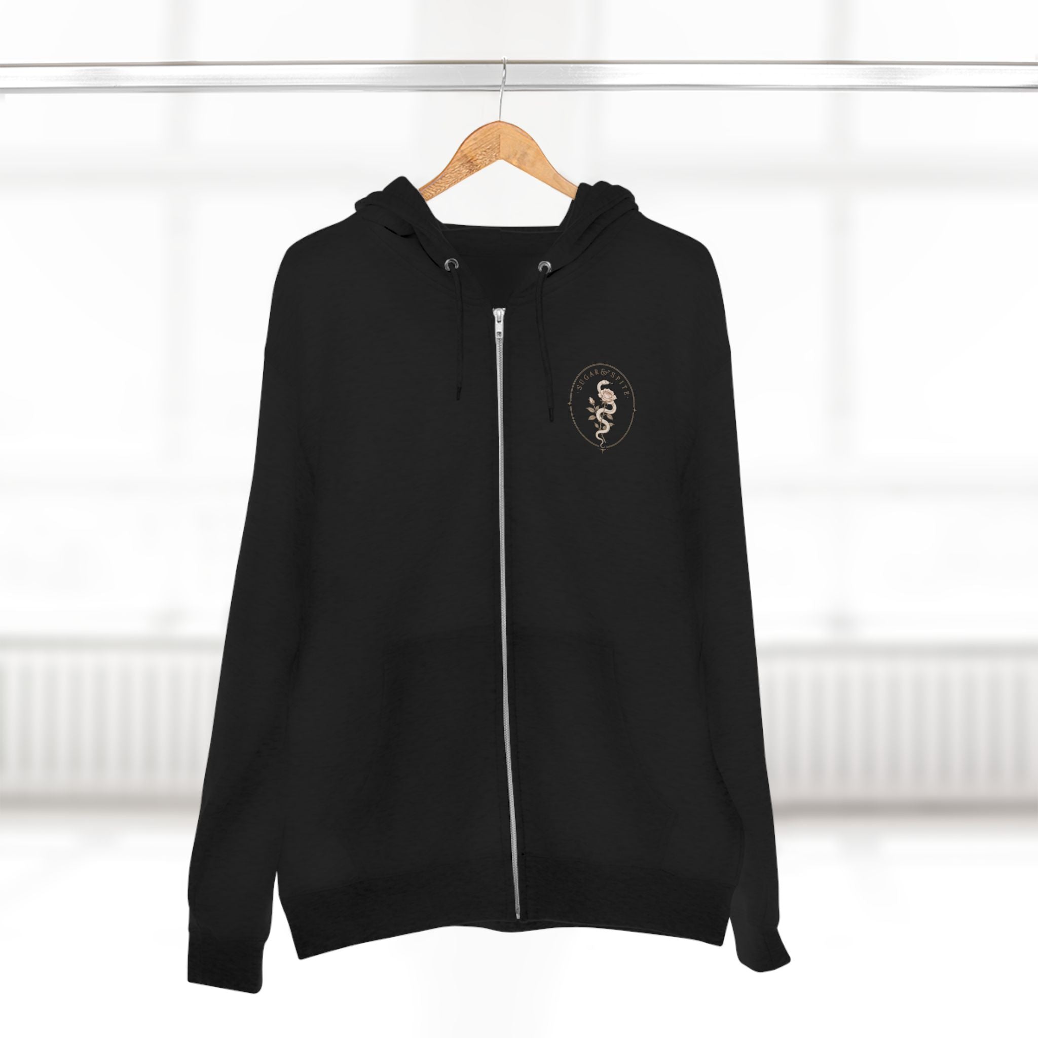 Minimal Floral Crest Zip Hoodie — Small Rose Emblem Chest Design